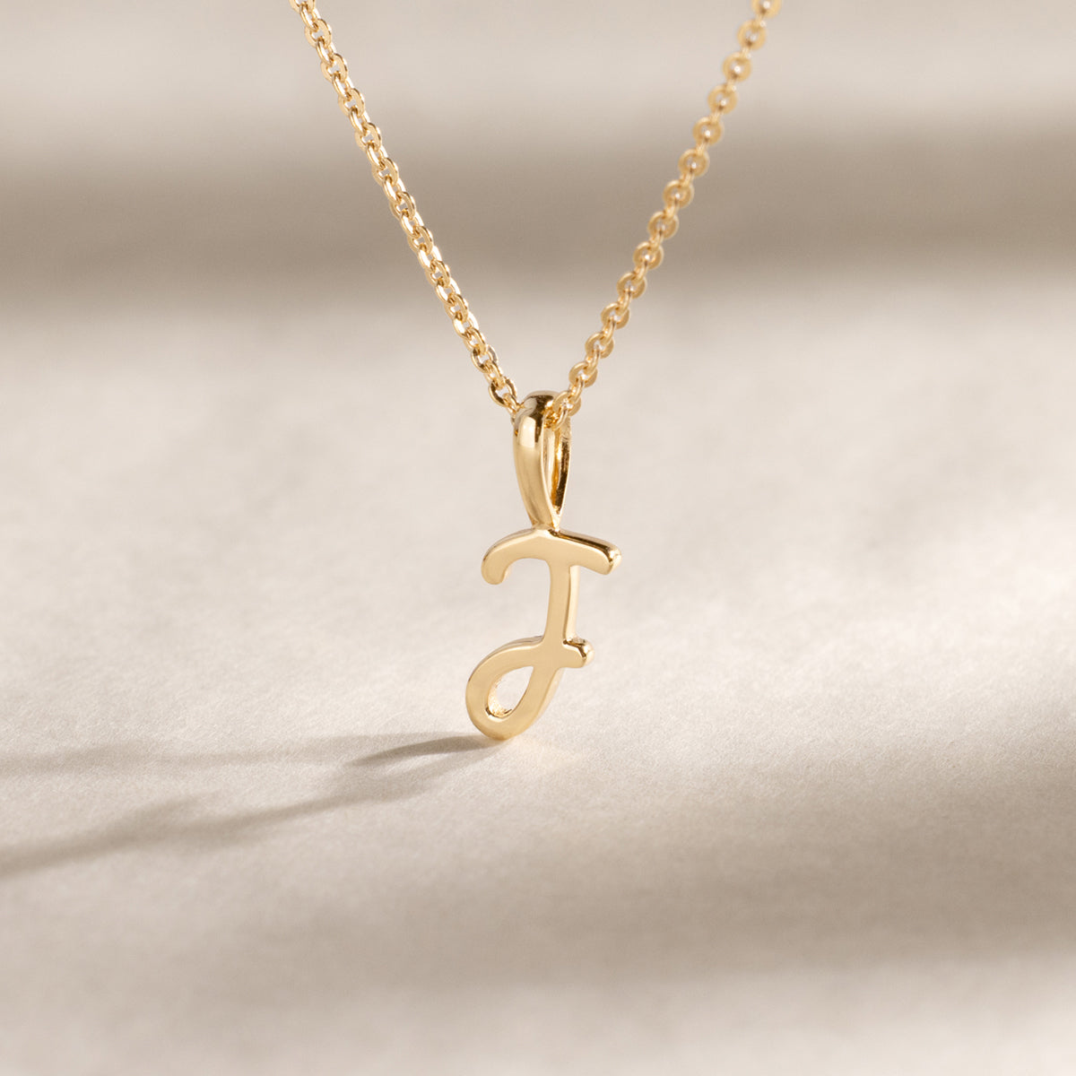 Script Initial Q Charm