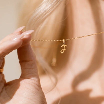 Script Initial L Charm